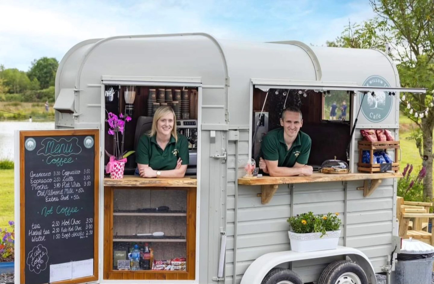 Shane and Joanne serving from The Willow Tree Café horsebox at Loch Mahon